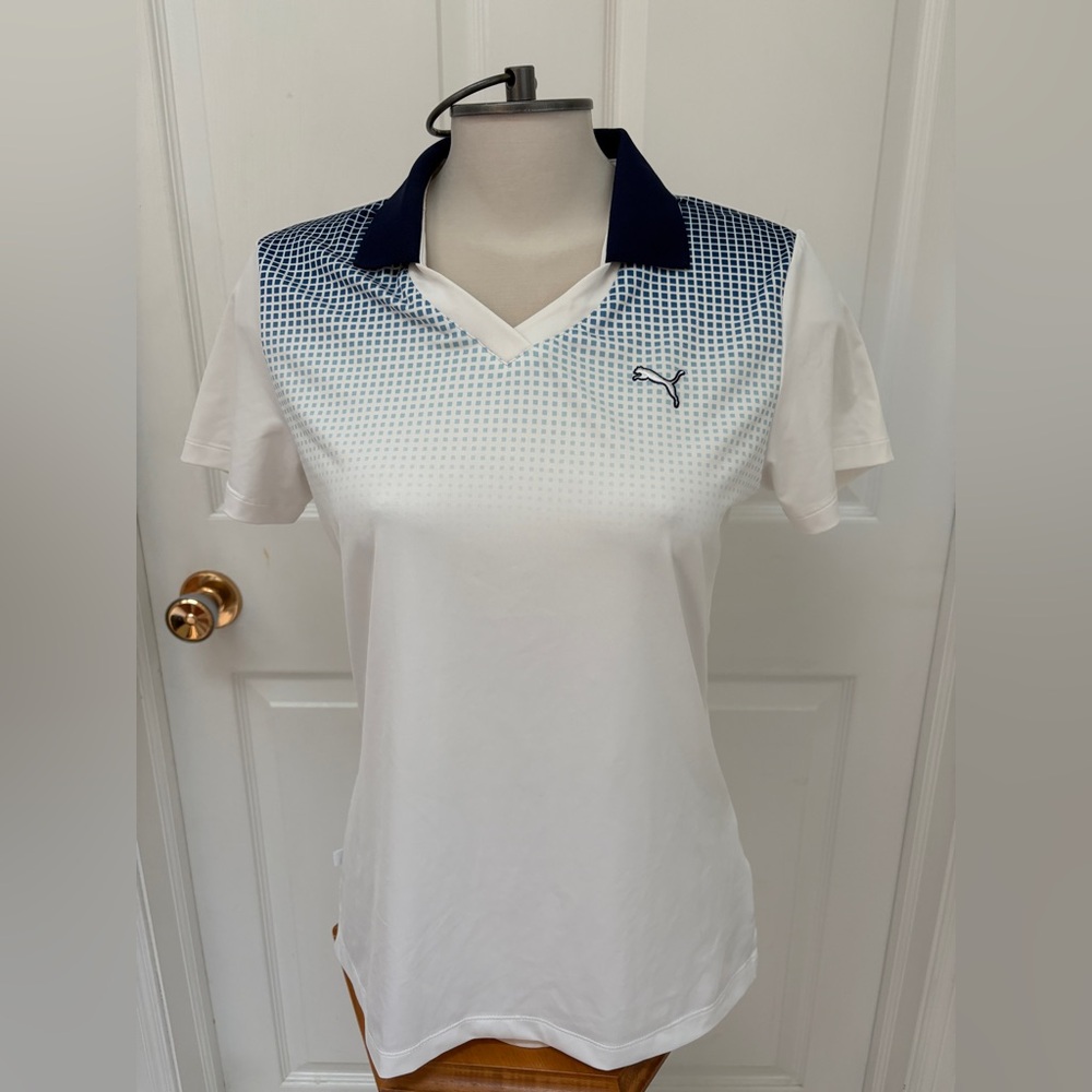 Puma ladies golf shirt size medium.